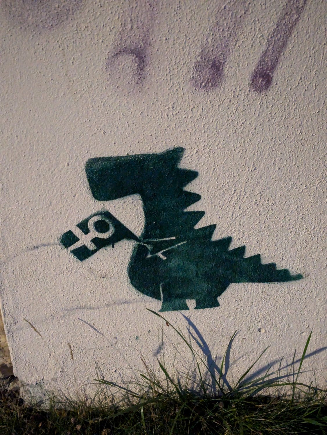 Stenciled T-Rex waving a feminism flag, sprayed with black on white wall